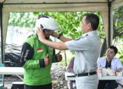 Kolaborasi Budaya Safety di Jalan Raya, Jasa Raharja Hadir di Tengah Komunitas Ojol Rawa Buaya, Jakarta.