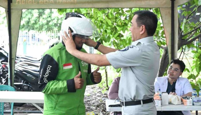 Kolaborasi Budaya Safety di Jalan Raya, Jasa Raharja Hadir di Tengah Komunitas Ojol Rawa Buaya, Jakarta