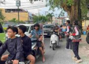 Semangat Berbagi di Ramadan, Komunitas Motor HALO Tebar 350 Paket Takjil di Simpang Empat Sriwijaya.